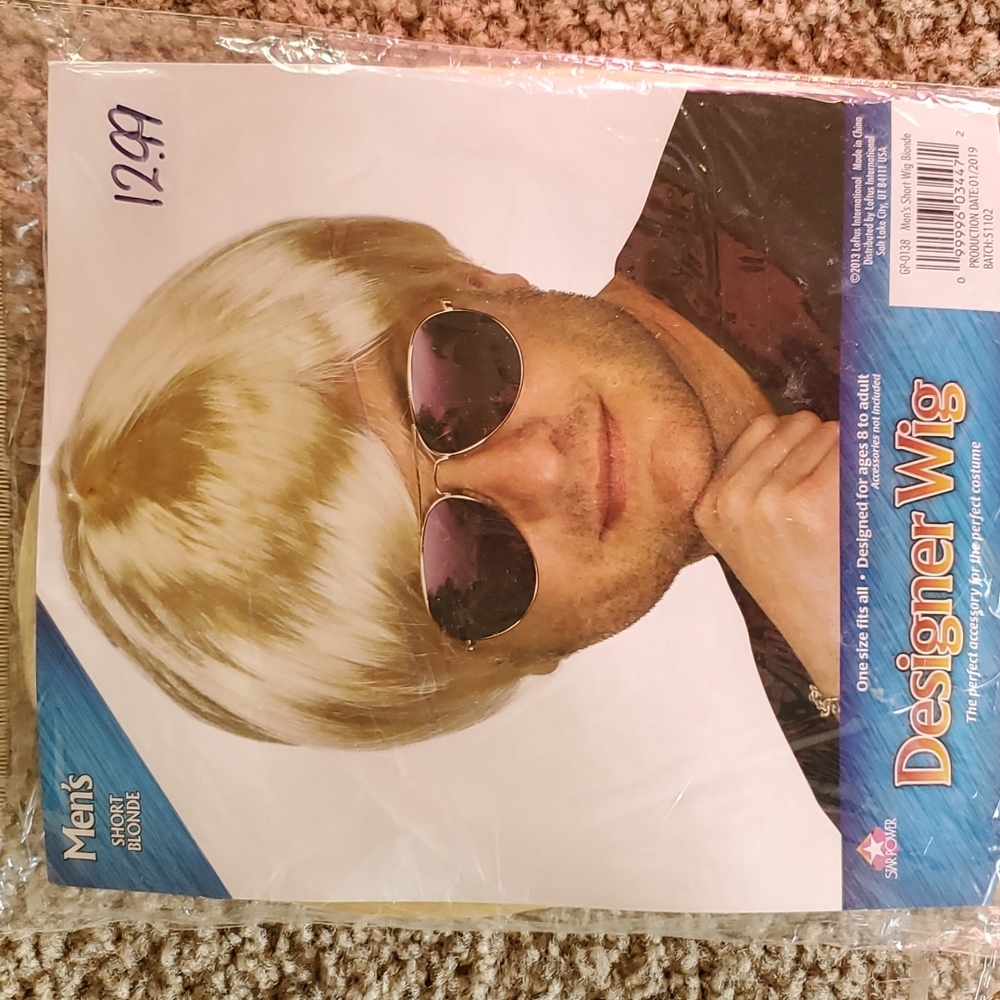 Brand new, never worn Platinum Blond/Blonde Wig